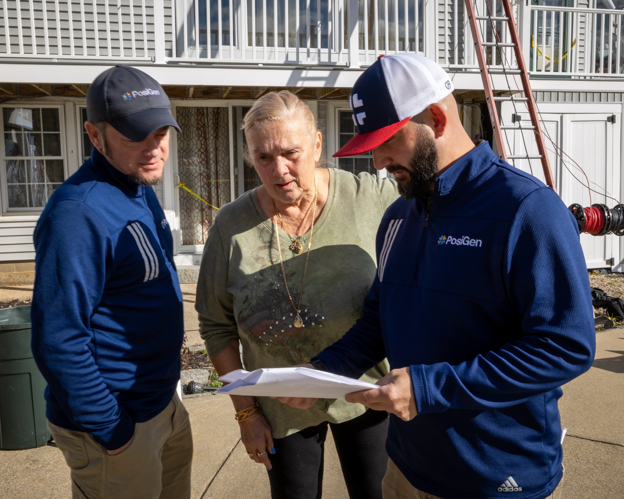 PosiGen team looking at install